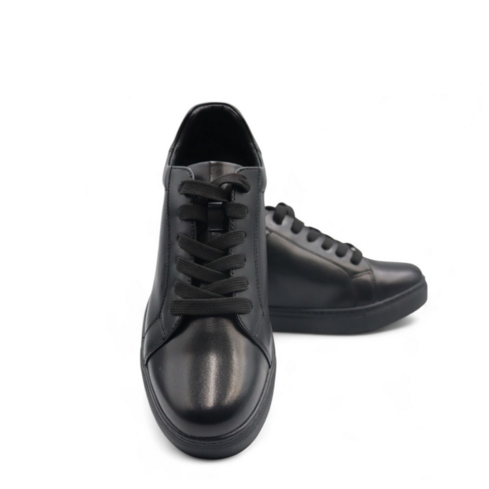 Black sneakers on a white background