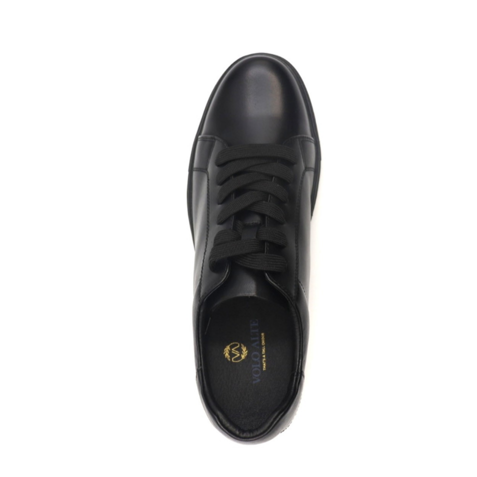Black leather shoe on a white background