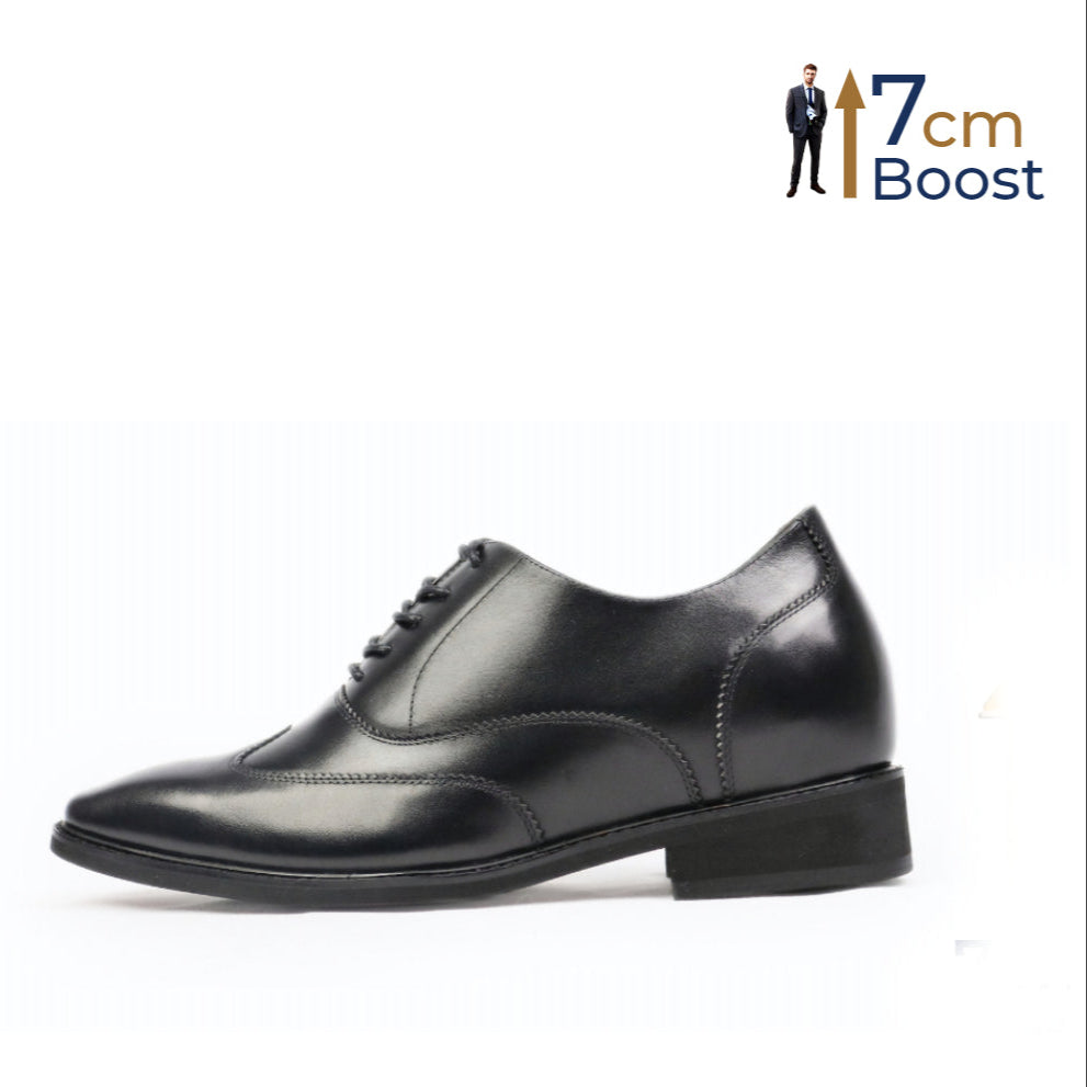 A black, lace-up wingtip dress shoe with a visible heel and a smooth, polished leather finish.